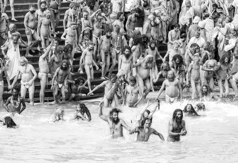 Naga Sadhus performing Shahi Snan in river Ganga on the occasion of Kumbh at Har ki Pauri, Haridwar, Uttarakhand